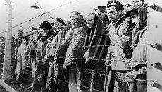 Узники концентрационного лагеря Освенцим, освобожденные войсками Красной армии. Архивное фото Узники концентрационного лагеря Освенцим, освобожденные войсками Красной армии. Архивное фото