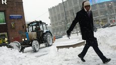 Снегопад в Москве. Архивное фото Снегопад в Москве. Архивное фото