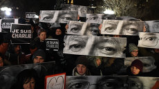 Акция в память о жертвах нападения на редакцию журнала Charlie Hebdo в Париже. Архивное фото Акция в память о жертвах нападения на редакцию журнала Charlie Hebdo в Париже. Архивное фото
