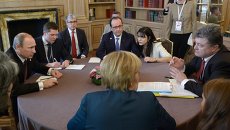 Главы России, Украины, Германии и Франции во время встречи в нормандском формате. Архивное фото Главы России, Украины, Германии и Франции во время встречи в нормандском формате. Архивное фото