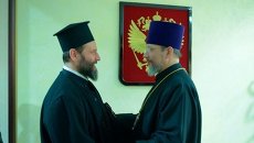 Протоиерей Николай Балашов от имени председателя ОВЦС приветствует архиепископа Охридского Иоанна Протоиерей Николай Балашов от имени председателя ОВЦС приветствует архиепископа Охридского Иоанна