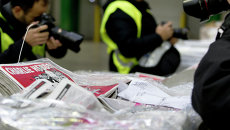 Номер Charlie Hebdo. Архивное фото Номер Charlie Hebdo. Архивное фото