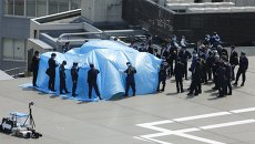 Купол над дроном, приземлившимся на крышу резиденции премьер-министра Японии Синдзо Абэ в Токио Купол над дроном, приземлившимся на крышу резиденции премьер-министра Японии Синдзо Абэ в Токио