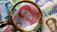Китайские банкноты номиналом в 100, 50, 20,10 и 5 юаней. Архивное фото Китайские банкноты номиналом в 100, 50, 20,10 и 5 юаней. Архивное фото