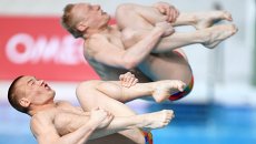 Прыжки в воду. Евгений Кузнецов и Илья Захаров. Архивное фото Прыжки в воду. Евгений Кузнецов и Илья Захаров. Архивное фото