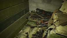 Склад с незаконным вооружением и угнанными автомобилями обнаружили в ЛНР Склад с незаконным вооружением и угнанными автомобилями обнаружили в ЛНР