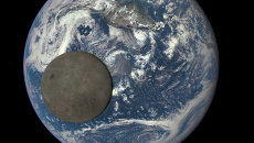 The unique picture of the moon in the background of the Earth, taken with the spacecraft Deep Space Climate Observatory (DSCOVR).  Archival photo