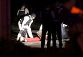 Человек, раненый во время стрельбы в Фергюсоне, США Человек, раненый во время стрельбы в Фергюсоне, США