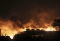 Горящие здания склада опасных веществ в промышленном городе Тяньцзинь Горящие здания склада опасных веществ в промышленном городе Тяньцзинь