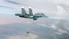 Истребитель-бомбардировщик Су-34 во время нанесения авиаударов. Архивное фото Истребитель-бомбардировщик Су-34 во время нанесения авиаударов. Архивное фото