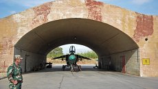 Самолет МИГ-23 сирийских ВВС на авиабазе Хама. Архивное фото Самолет МИГ-23 сирийских ВВС на авиабазе Хама. Архивное фото