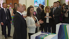 Выставка в честь юбилея RT: визит Путина и видеообращение Ларри Кинга Выставка в честь юбилея RT: визит Путина и видеообращение Ларри Кинга