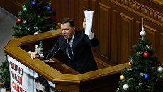 Лидер Радикальной партии Олег Ляшко на заседании Верховной Рады Украины. Архивное фото Лидер Радикальной партии Олег Ляшко на заседании Верховной Рады Украины. Архивное фото