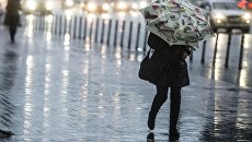 Дождь в Москве. Архивное фото Дождь в Москве. Архивное фото
