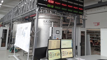 Containers with liquid nitrogen, where scientists check superconducting magnets NICA