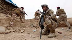 Иракский солдат во время военной операции в Мосуле, Ирак Иракский солдат во время военной операции в Мосуле, Ирак
