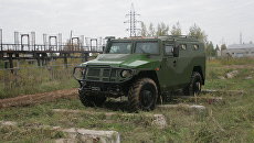 Бронированная полицейская машина Тигр. Архивное фото Бронированная полицейская машина Тигр. Архивное фото