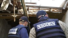 Представители Специальной мониторинговой миссии (СММ) ОБСЕ. Архивное фото Представители Специальной мониторинговой миссии (СММ) ОБСЕ. Архивное фото