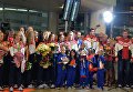 Члены олимпийской сборной России во время церемонии встречи в аэропорту Шереметьево Члены олимпийской сборной России во время церемонии встречи в аэропорту Шереметьево