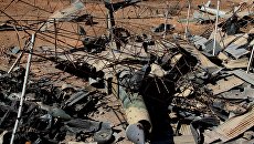 Уничтоженный военный самолет на юге сирийского города Алеппо. Архивное фото Уничтоженный военный самолет на юге сирийского города Алеппо. Архивное фото