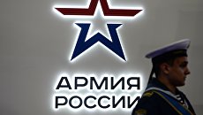 Посетитель на Международном военно-техническом форуме АРМИЯ. Архивное фото Посетитель на Международном военно-техническом форуме АРМИЯ. Архивное фото