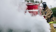 Тушение пожара. Архивное фото Тушение пожара. Архивное фото