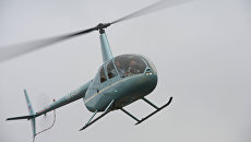 Вертолет Robinson R44. Архивное фото Вертолет Robinson R44. Архивное фото