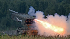 Тяжёлая огнемётная система залпового огня на базе танка Т-72 ТОС-1 Буратино. Архивное фото Тяжёлая огнемётная система залпового огня на базе танка Т-72 ТОС-1 Буратино. Архивное фото