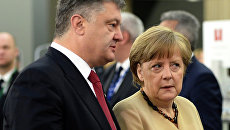 Президент Украины Петр Порошенко и канцлер Германии Ангела Меркель. Архивное фото Президент Украины Петр Порошенко и канцлер Германии Ангела Меркель. Архивное фото
