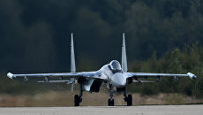 Многоцелевой истребитель Су-35. Архивное фото Многоцелевой истребитель Су-35. Архивное фото