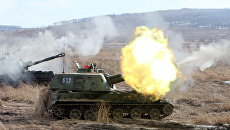 Самоходная артиллерийская установка 2С3 Акация на учениях артиллерийских подразделений общевойсковой армии Восточного военного округа. Архивное фото Самоходная артиллерийская установка 2С3 Акация на учениях артиллерийских подразделений общевойсковой армии Восточного военного округа. Архивное фото
