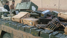 Оружие и боеприпасы, сданные боевиками правительственным сирийским войскам в городе Хан аш-Ших Оружие и боеприпасы, сданные боевиками правительственным сирийским войскам в городе Хан аш-Ших
