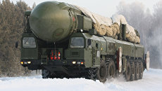 Ракетный комплекс Тополь движется на пункт постоянной дислокации в ракетных войсках стратегического назначения ЦВО. Архивное фото Ракетный комплекс Тополь движется на пункт постоянной дислокации в ракетных войсках стратегического назначения ЦВО. Архивное фото