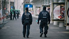 Сотрудники полиции в Берлине. Архивное фото Сотрудники полиции в Берлине. Архивное фото