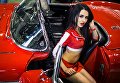 Модель на выставке Motorsport Expo в КВЦ Сокольники в Москве Модель на выставке Motorsport Expo в КВЦ Сокольники в Москве