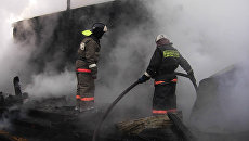 Сотрудники МЧС республики Бурятия на месте пожара Сотрудники МЧС республики Бурятия на месте пожара