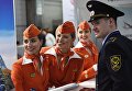 Стюардессы у стенда авиакомпании Аэрофлот на национальной выставке инфраструктуры гражданской авиации - NAIS 2017 в Москве Стюардессы у стенда авиакомпании Аэрофлот на национальной выставке инфраструктуры гражданской авиации - NAIS 2017 в Москве
