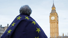 У здания Парламента в Лондоне, Великобритания. Архивное фото У здания Парламента в Лондоне, Великобритания. Архивное фото