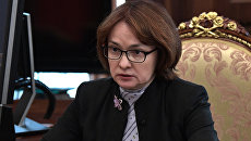 Председатель Центрального банка РФ Эльвира Набиуллина во время встречи с президентом РФ Владимиром Путиным. 22 марта 2017 Председатель Центрального банка РФ Эльвира Набиуллина во время встречи с президентом РФ Владимиром Путиным. 22 марта 2017