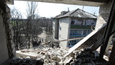 На улице Привокзальной в прифронтовом поселке Донецк-Северный в Донецкой области На улице Привокзальной в прифронтовом поселке Донецк-Северный в Донецкой области