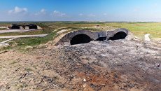 Последствия ракетного удара США по авиабазе в Сирии Последствия ракетного удара США по авиабазе в Сирии