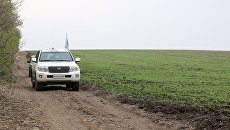 На месте подрыва автомобиля наблюдателей ОБСЕ близ села Пришиб в ЛНР На месте подрыва автомобиля наблюдателей ОБСЕ близ села Пришиб в ЛНР