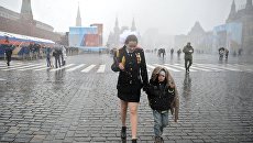 Мокрый снег в Москве. Архивное фото Мокрый снег в Москве. Архивное фото