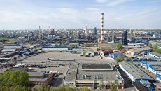 Московский нефтеперерабатывающий завод в районе Капотня. Архивное фото Московский нефтеперерабатывающий завод в районе Капотня. Архивное фото