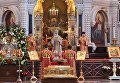 Патриарх Московский и всея Руси Кирилл во время богослужения в храме Христа Спасителя, где находится ковчег с мощами святителя Николая Чудотворца Патриарх Московский и всея Руси Кирилл во время богослужения в храме Христа Спасителя, где находится ковчег с мощами святителя Николая Чудотворца