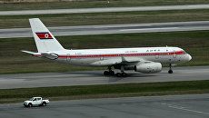 Самолет авиакомпании Air Koryo в международном аэропорту Владивосток. Архивное фото Самолет авиакомпании Air Koryo в международном аэропорту Владивосток. Архивное фото