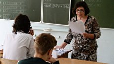Сдача ЕГЭ в школах России. Архивное фото Сдача ЕГЭ в школах России. Архивное фото