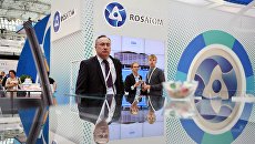 Стенд государственной корпорации по атомной энергии Росатом на IX Международном форуме Атомэкспо в Москве. 19 июня 2017 Стенд государственной корпорации по атомной энергии Росатом на IX Международном форуме Атомэкспо в Москве. 19 июня 2017