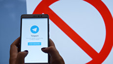 Мессенджер Telegram на экране телефона. Архивное фото Мессенджер Telegram на экране телефона. Архивное фото