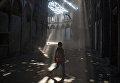 Дети играют в одном из зданий разрушенного района Хомса аль Хамидия. Сирия, 12.12.2015 Дети играют в одном из зданий разрушенного района Хомса аль Хамидия. Сирия, 12.12.2015